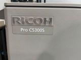 a close up of a refrigerator with the name ricoh on it