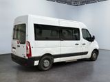 a white van that is parked in a large room