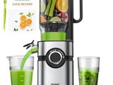 an image of a blender filled with fruit and vegetables next to a glass of juice