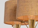 three lamps on a white surface with a brown shade