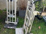 a small hand truck and a small hand truck in the yard