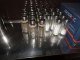many salt and pepper shakers on the counter