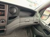 a dashboard of a car with a steering control panel