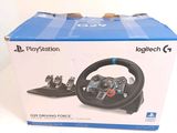 a box with a steering wheel on it on a table