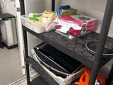 a shelf that has various items on it in a room