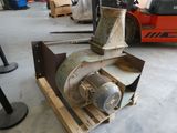 a machine that is sitting on a pallet in a warehouse