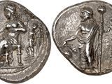 a silver coin with an image of a man and a woman