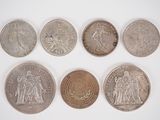six different british coins including one penny, one penny, one penny, one penny and one penny