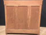 an old wooden chest sitting on top of a hard wood floor