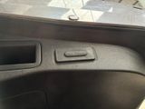 a close up of a car dashboard with the door open