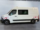 a white van with red stripes parked in a garage