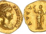 a gold coin with an image of a woman on it