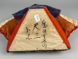 an image of a close up of a piece of cloth with writing on it