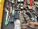 a lot of tools that are sitting on a table