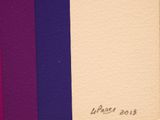 three different colored sheets of paper with writing on them