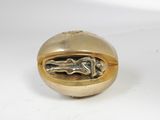 a gold bead with a picture of a person inside of it