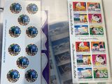 a box of stamps with a picture of the world on it