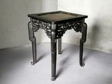 a small table that is sitting in a room