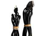 two black cords connected to each other on a white surface