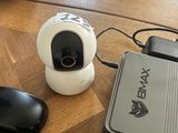 an image of a camera and a keyboard on a desk