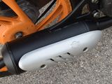 a close up view of a motor bike with a handlebar