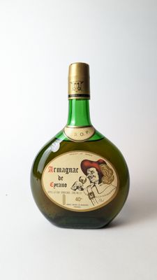 une bouteille verte sur laquelle est représentée une femme