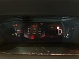 the dashboard of a car with a digital display on it