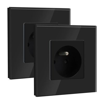 a pair of black electrical outlets on a white background