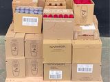 many boxes of fruit on a pallet in a warehouse