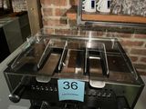 an image of a toaster with a number on it