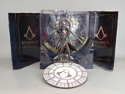 a figurine of a woman with a clock in front of a box