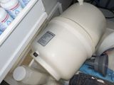 an image of a water tank in a cabinet