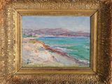 une peinture à l'huile représentant une scène de plage, dans un cadre doré