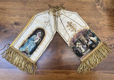 two pieces of cloth with a picture of a woman and a man on them