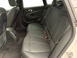 the back seats of a car are empty with no one in it