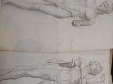 two drawings of a man and a woman laying on the ground