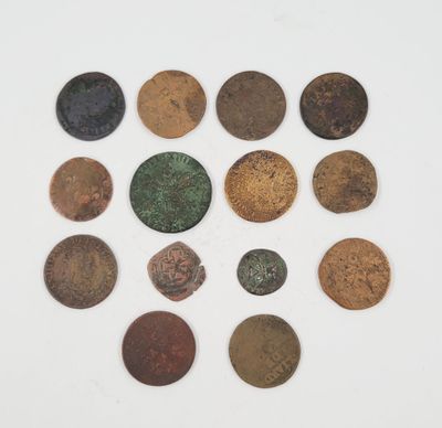a collection of roman coins, including a roman coin and a roman coin