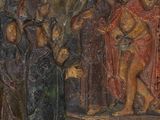 une image représentant un tableau où l'on voit un groupe de personnes debout sur une scène