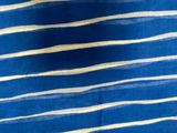 a close up of a blue and white striped fabric