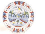 a plate with a picture of a castle on it