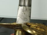 a close up of a person holding a knife in their hand