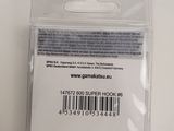 a plastic card with a barcode on it on a table