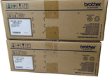 two boxes of brother black toner paper stacked on top of each other