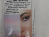an image of a package of makeup products with a picture of a woman ' s face
