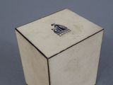 a small white box with a bird on it