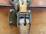 a close up of a piece of luggage with a buckle on it