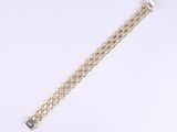 an image of a gold chain bracelet with a diamond clasp