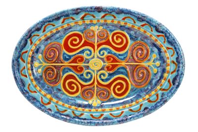 a picture of a blue and red plate with a design on it