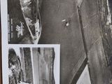 a black and white photo of a plane in the air