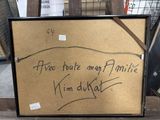 a picture of a picture with writing on it on a table